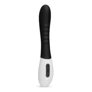 Oplaadbare vibrator met USB-kabel op een schone ondergrond