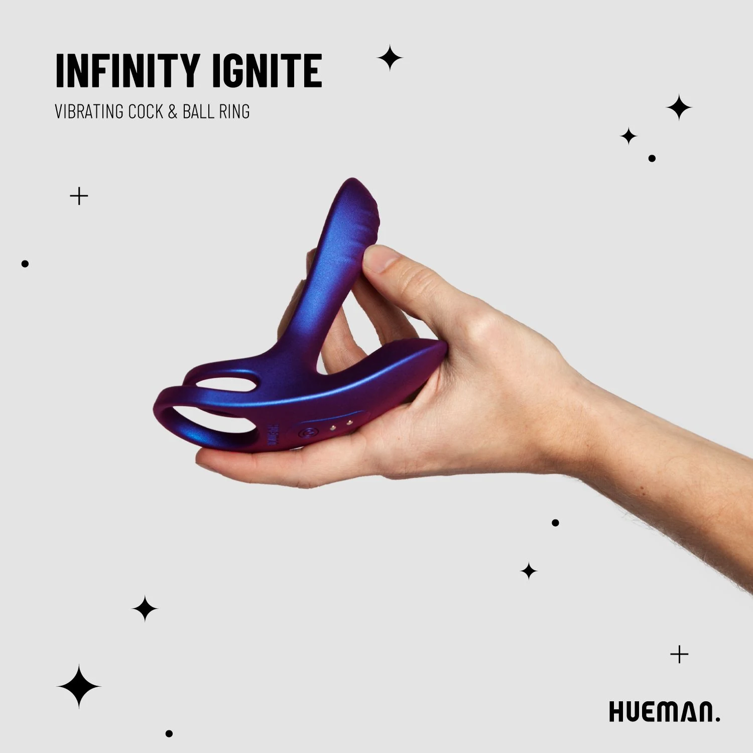 Paarse Hueman cockring met vibratie en pushbutton bediening