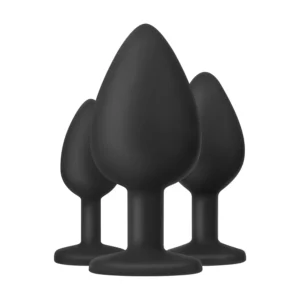 Discrete buttplug naast glijmiddel op rustige achtergrond