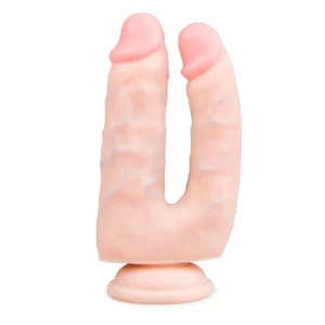 Dildo en glijmiddel discreet op een schone ondergrond